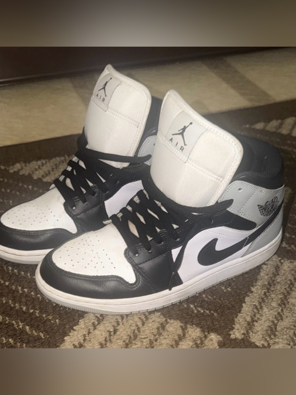 Jordan Black and White High-Top Sneakers